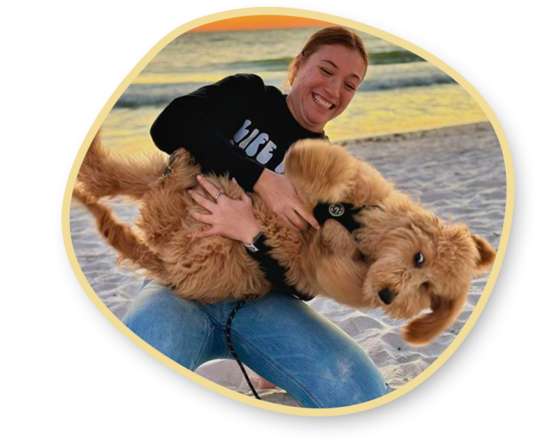 Woman with her goldendoodle